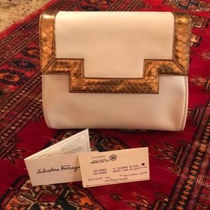 Ferragamo white clutch w/ bronze lizard trim E.C.